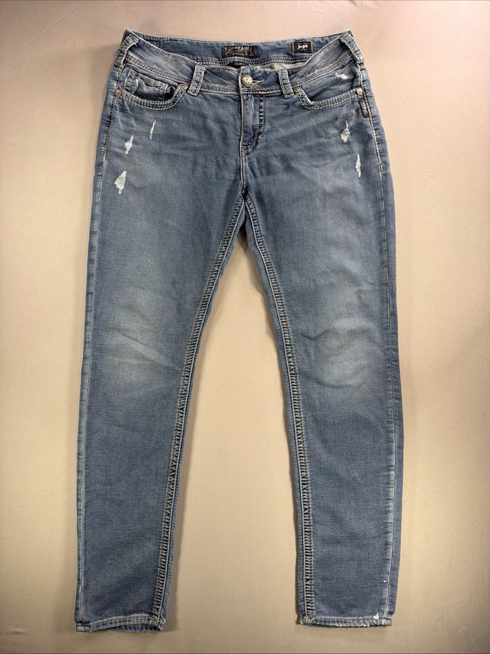 Silver Jeans Faded Light Blue Distressed Jeggings